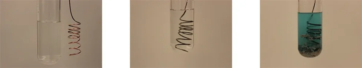Photograph showing a copper wire immersed in a zinc sulfate solution, demonstrating a displacement reaction where the more active metal displaces the less active one
