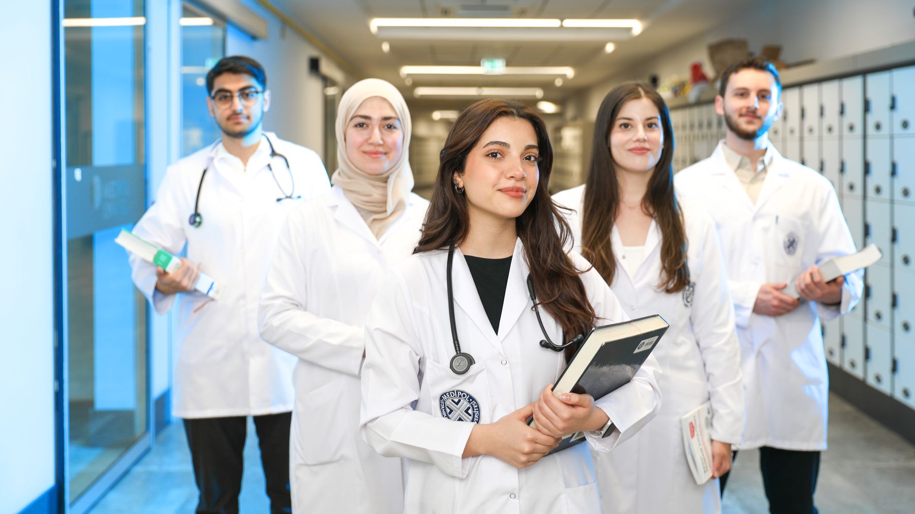 Diverse group of medical students in the hallway of a teaching hospital